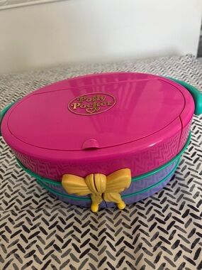 Polly Pocket Pink Oval Carry Case with Yellow Bow